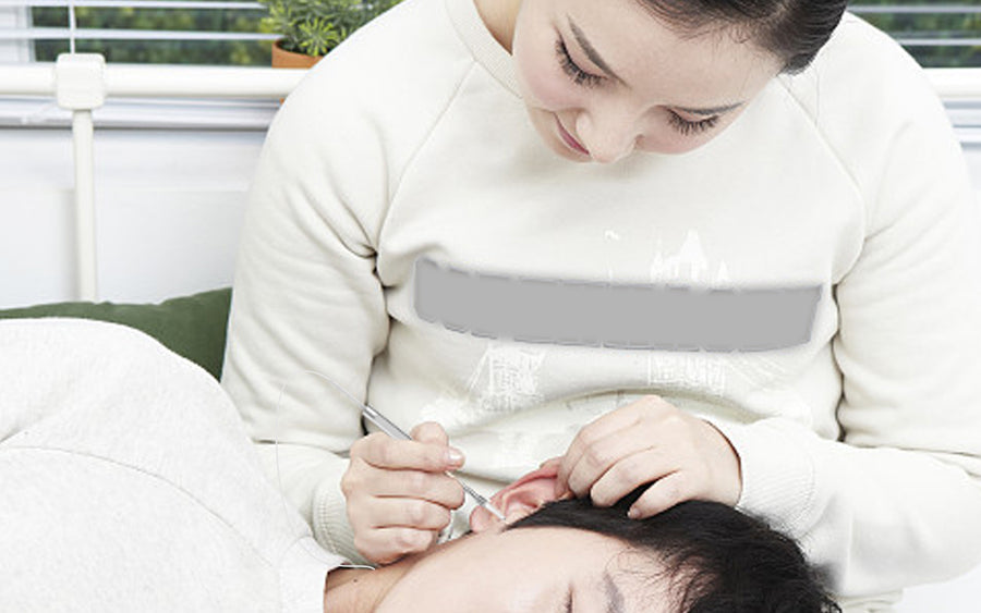What does the earwax removal kit contain ?