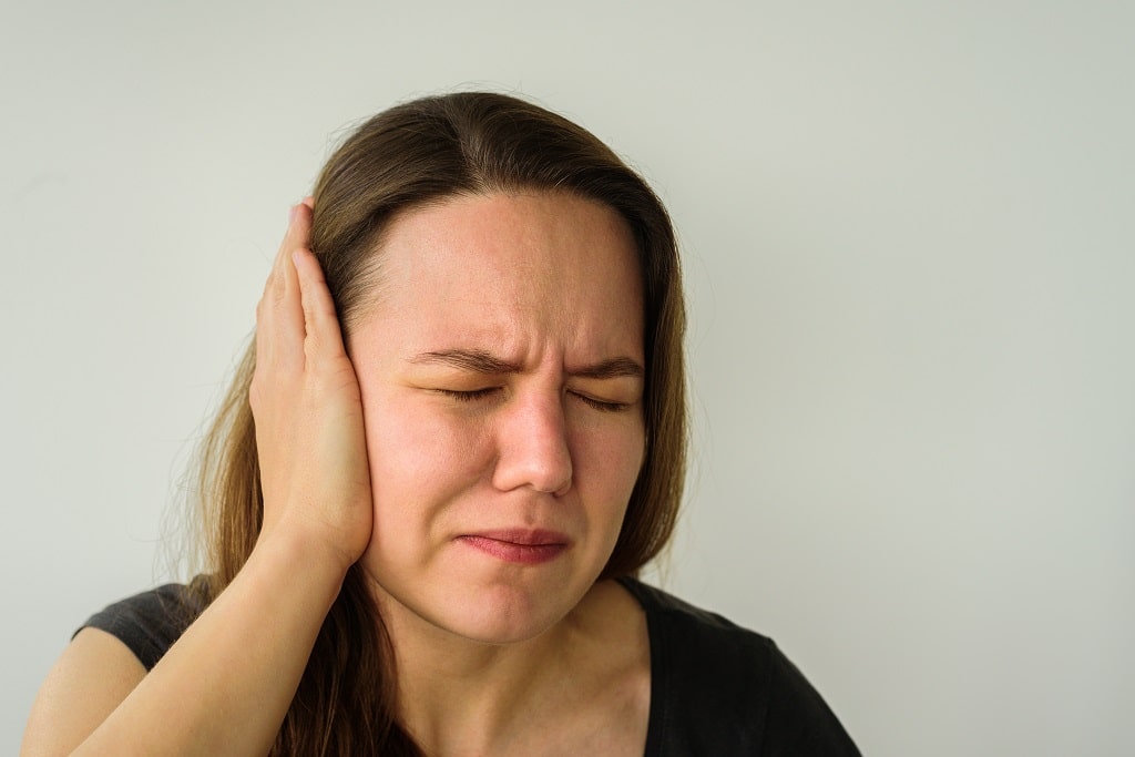 Why does my ear hurt when I wake up?