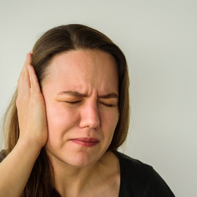 Why does my ear hurt when I wake up?