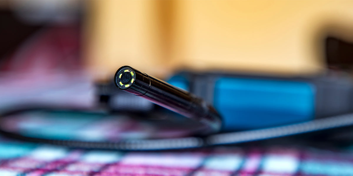 Close-up of a borescope camera probe with LED lights