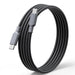 Full view of the coiled Teslong USB-C charging cable
