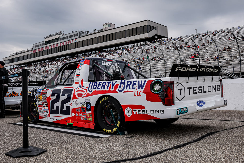 Teslong branding on the number 22 Ford truck at New Hampshire Motor Speedway