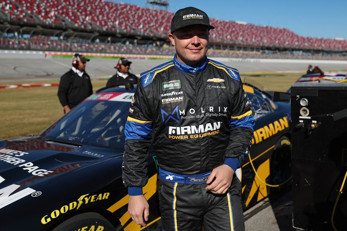 Patrick Emerling beside the No. 38 Chevrolet before qualifying at Talladega · Photo: David Rosenblum / NKP